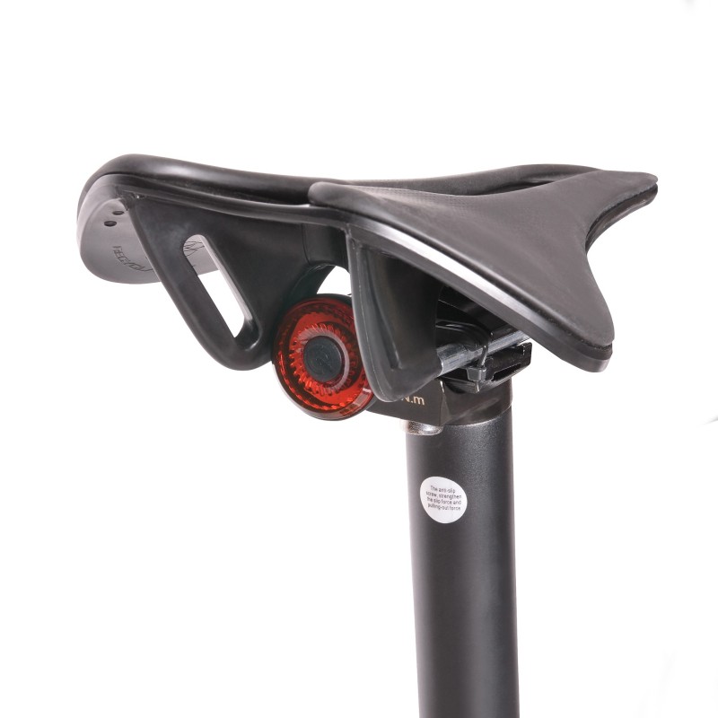 Okrągła mała i mocna lampka rowerowa dla graveli i rowerów szosowych. Montaż lampki pod siodełkiem. BN94328